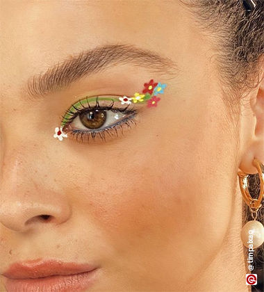 Eye makeup with flowers painted on the eyes