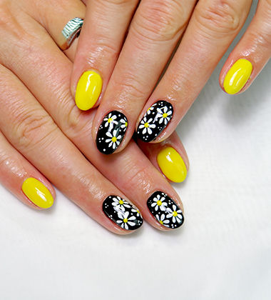 Black and yellow floral nail art
