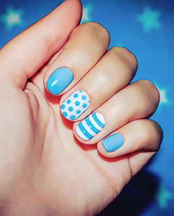 Aqua nail art with polka dots