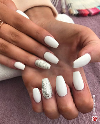 White nails with silver glitter accent