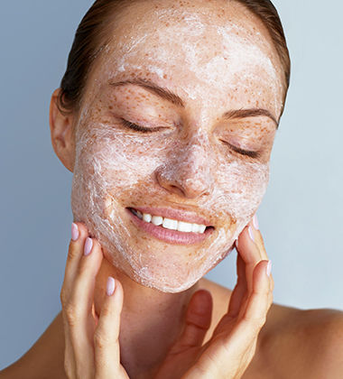 woman exfoliating