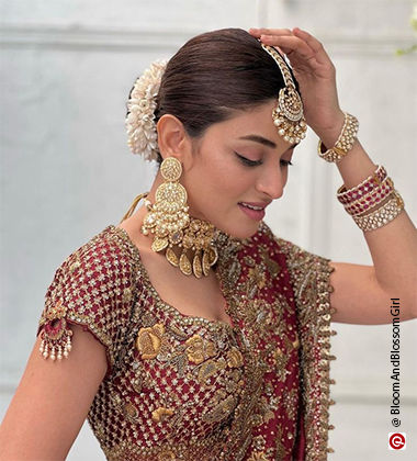woman wearing a red lehenga