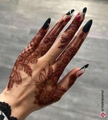 Bridal hands with black nail paint