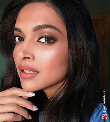 Deepika Padukone in a blue shirt