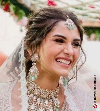 woman wearing a white lehenga