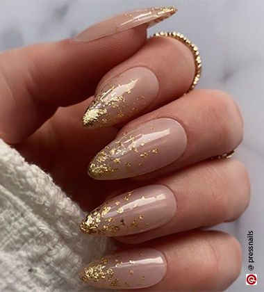 golden colour nail art - gold flakes