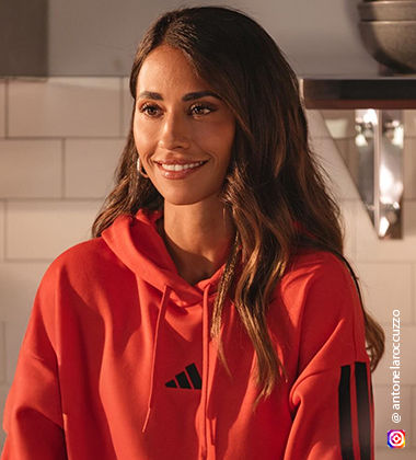 woman wearing an Adidas orange hoodie