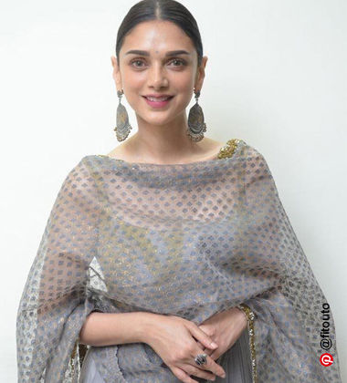 Aditi Rao Hydari wearing a grey ethnic wear with mauve pink lipstick